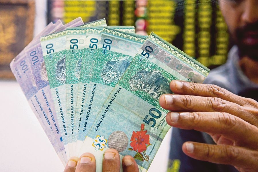 Ringgit opens lower as markets await BNM decision