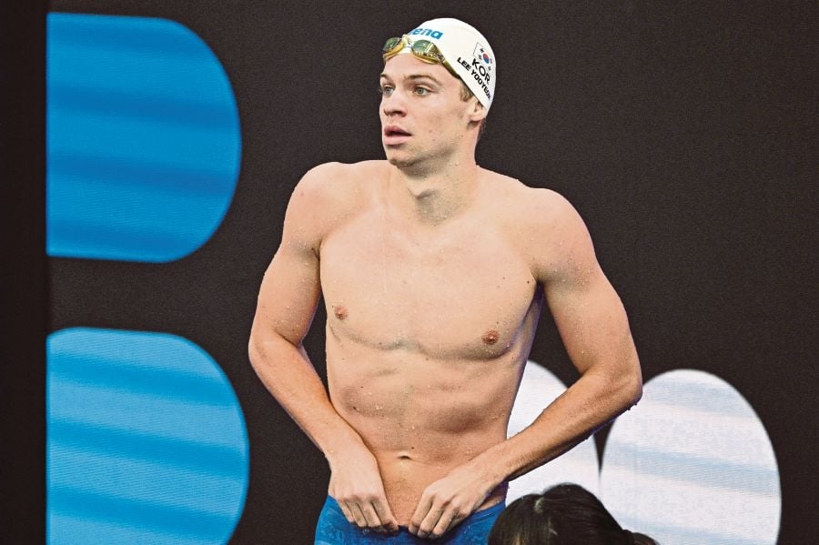 Marchand, McIntosh top bill at swimming worlds with 2028 on minds