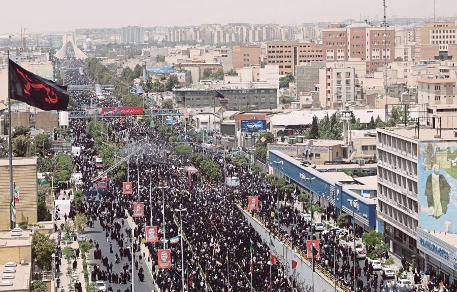Iran holds state funeral for top brass slain in war with Israel
