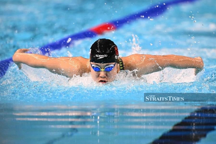 Rivals laud 'phenomenally talented' 12-year-old swim sensation