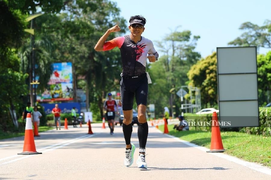 Bella's son Ayden, Syed Saddiq brave Desaru triathlon