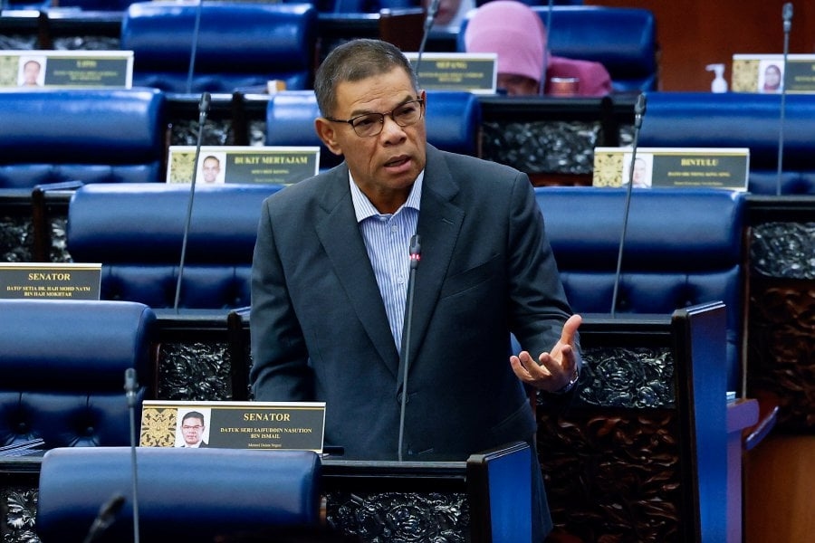Tougher penalties for fake MyKad use to be tabled in Parliament