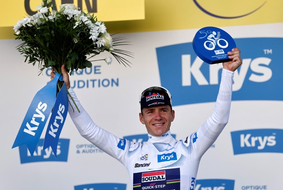Evenepoel triumphs in Tour de France time trial as Pogacar slips into yellow