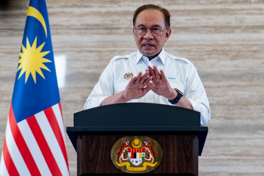 Anwar shrugs off Dr M's Batu Puteh dare
