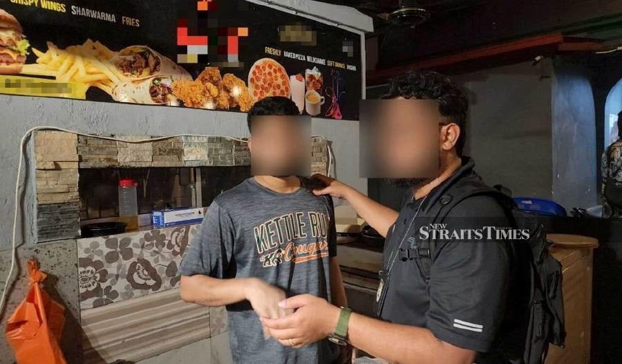Restaurant owner weeps as immigration nabs him for illegal workers