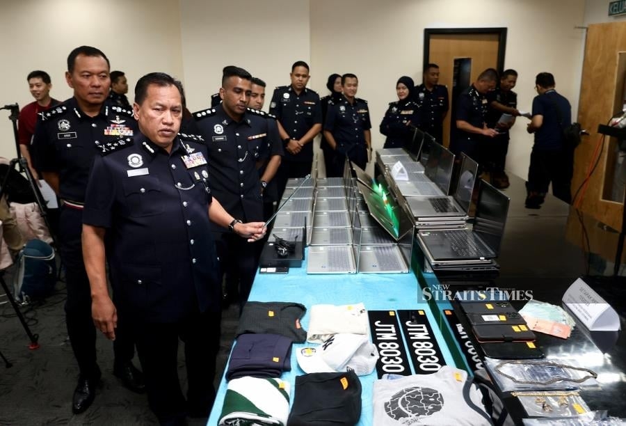 Police bust porn scam syndicate, 57 arrested