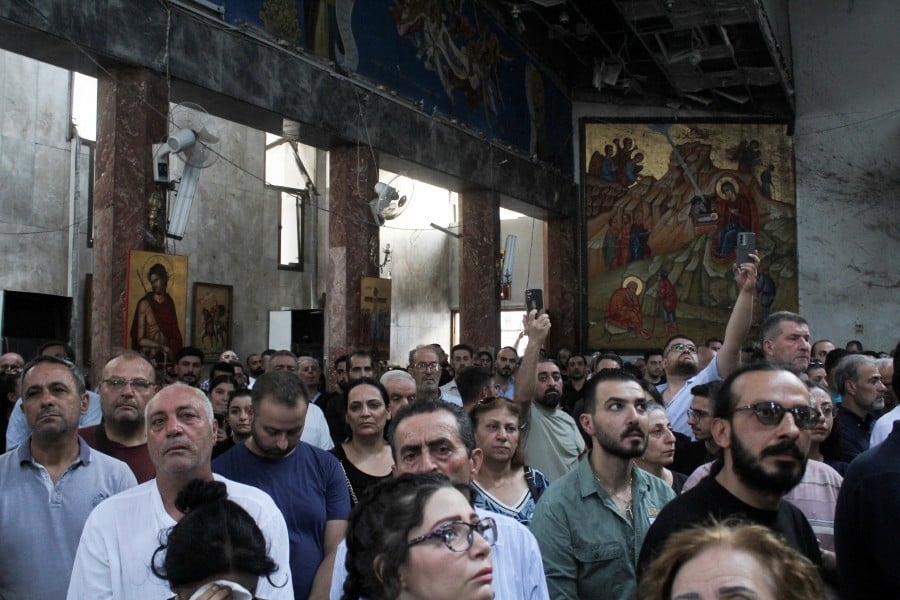 Fearful Syrian Christians demand justice, protection after church bombing