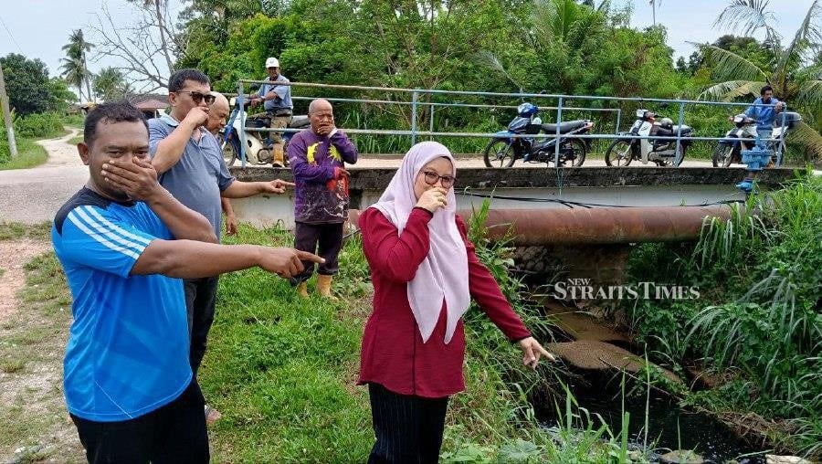 Black, polluted river sparks outrage in Sungai Udang village