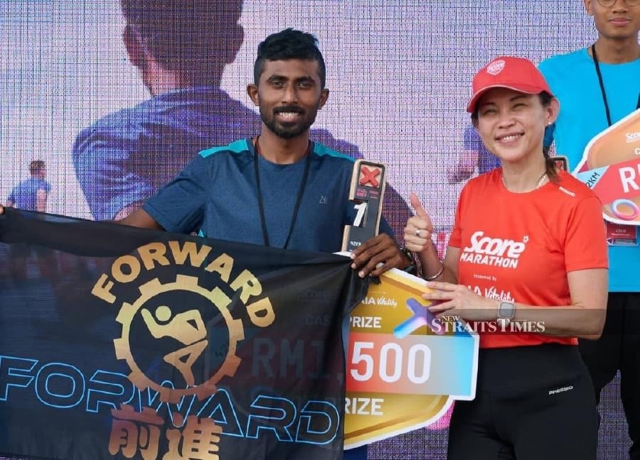 First-time marathoner Sivaneshwaran stuns field in Putrajaya