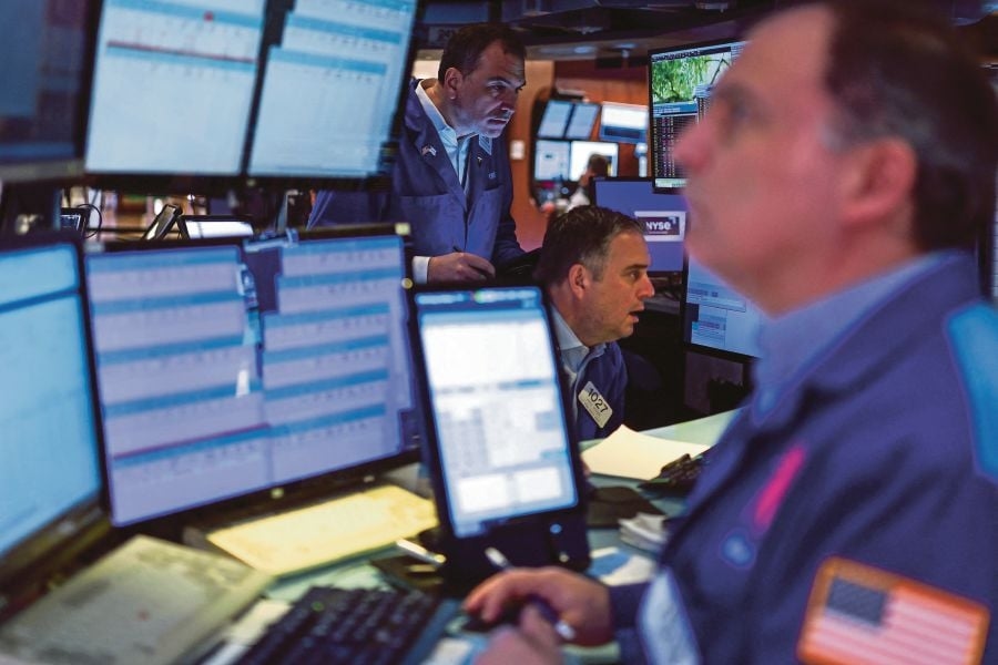 Wall Street ends mixed amid cooling Middle East tensions