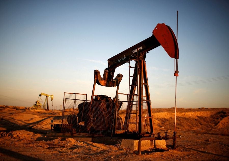 Oil prices little changed as investors eye impact of new sanctions on Russia