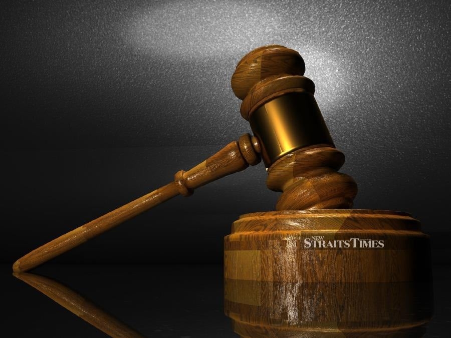 Woman charged with 743 counts of database tampering, to undergo psychiatric evaluation