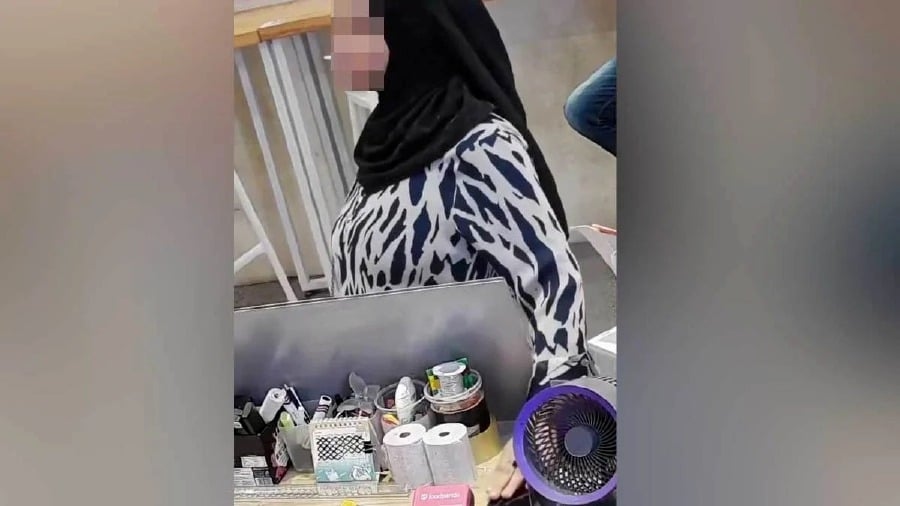 Police urge woman in viral phone theft video to surrender