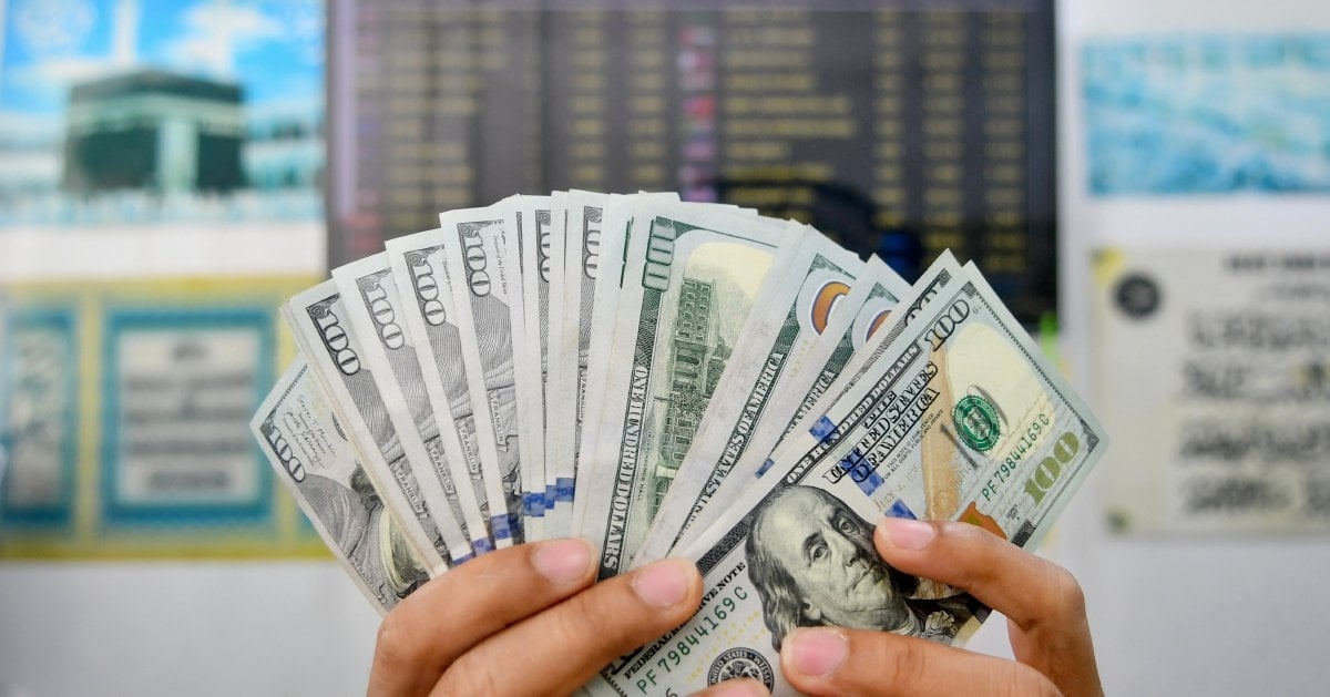 Dollar set for weekly gain as firm US data tempers Fed easing bets