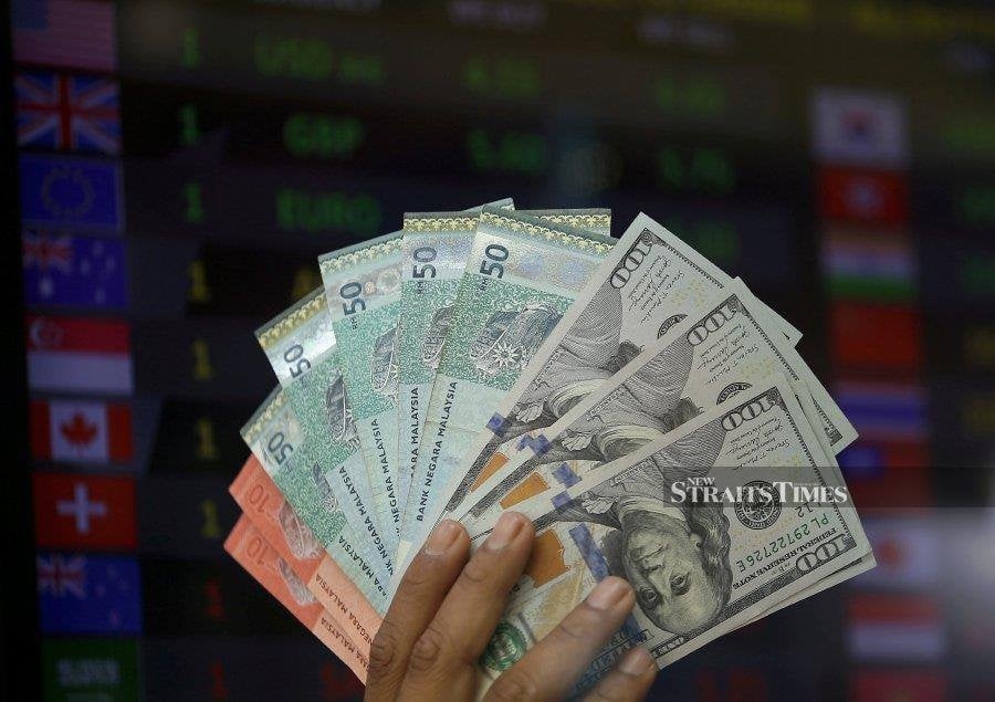 Ringgit weakens to US dollar, rises against other major currencies
