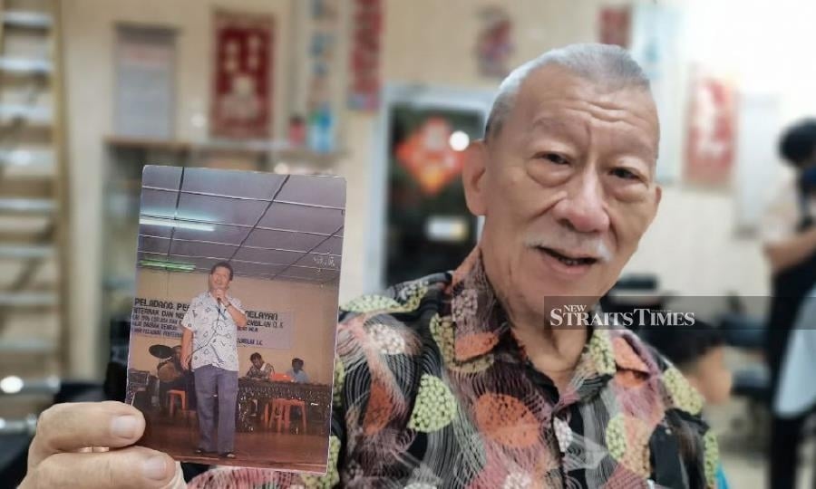 Snip, style, serenade: Rembau barber blends smooth cuts with P. Ramlee classics