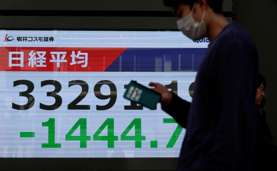 Japan's Nikkei soars to one-year peak on trade deal; bonds slide
