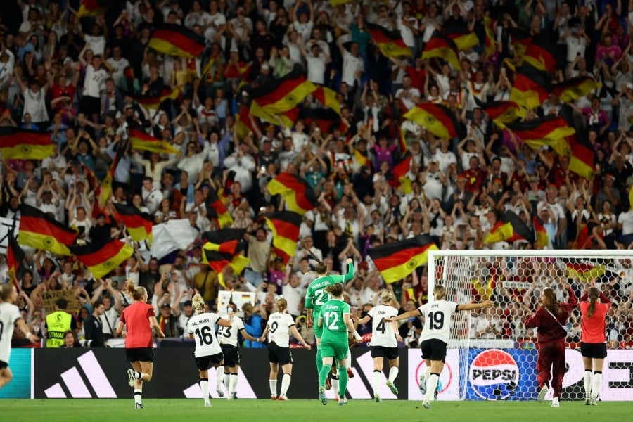 Ten-woman Germany beat France on penalties to reach Euro 2025 semis
