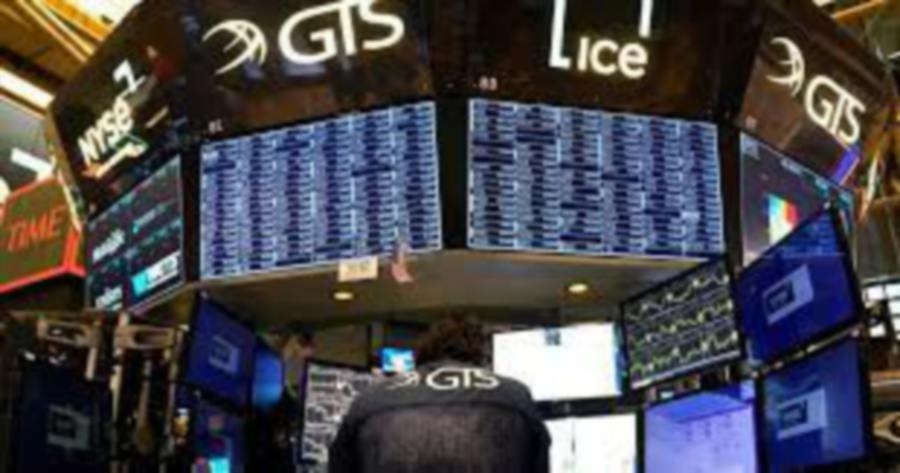 Equities close lower as earnings weigh; Fed statement on tap