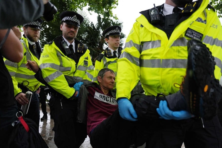 UK police arrest scores of Palestine Action supporters