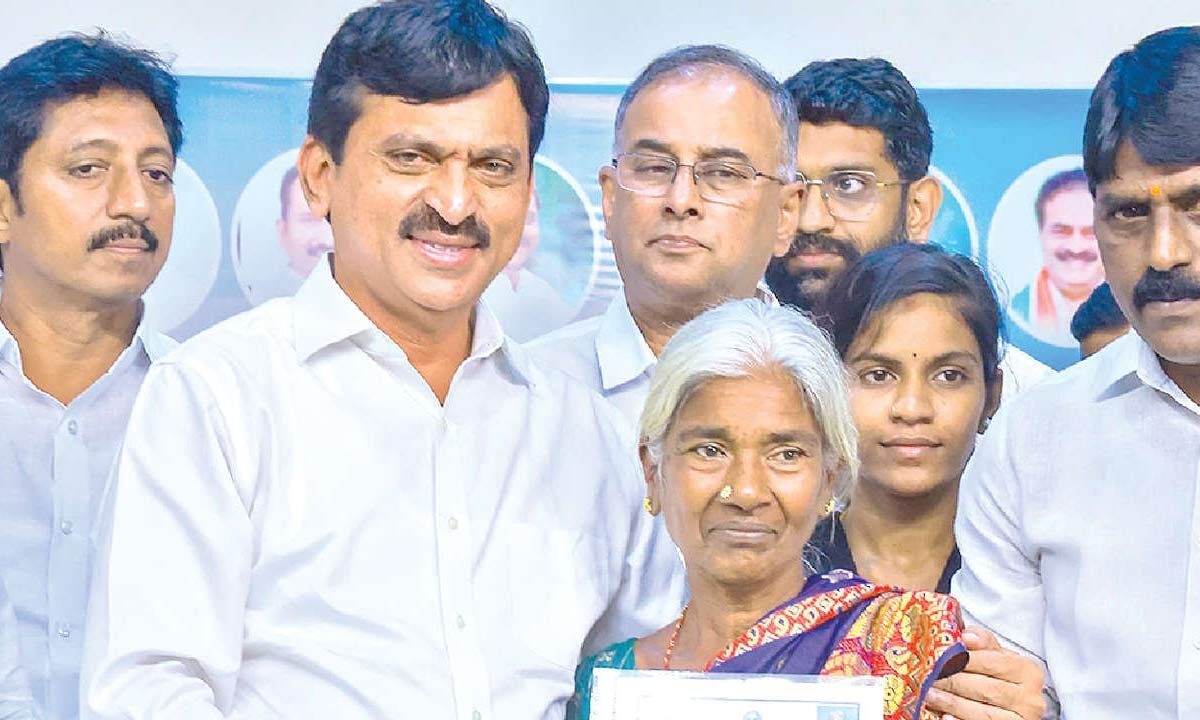 Minister Ponguleti distributes Indiramma house papers to beneficiaries at Kothagudem