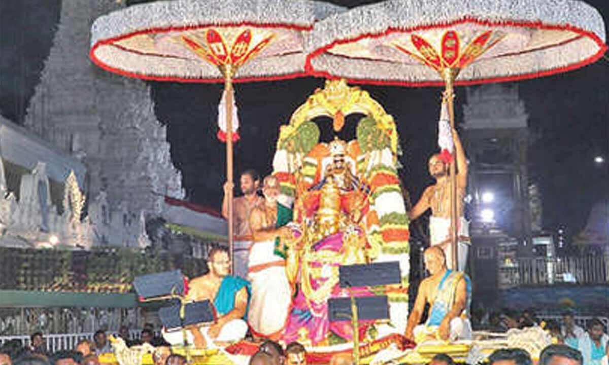 Lord Malayappa rides on Garuda Vahanam
