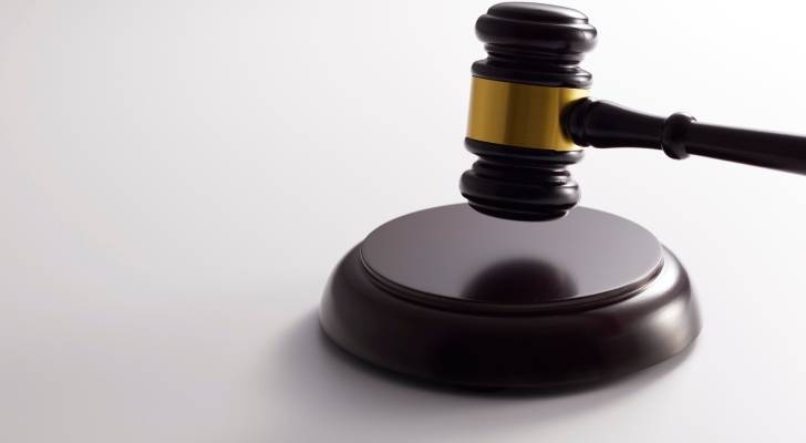 Twelve charged with murder in Jordan's contaminated alcohol case