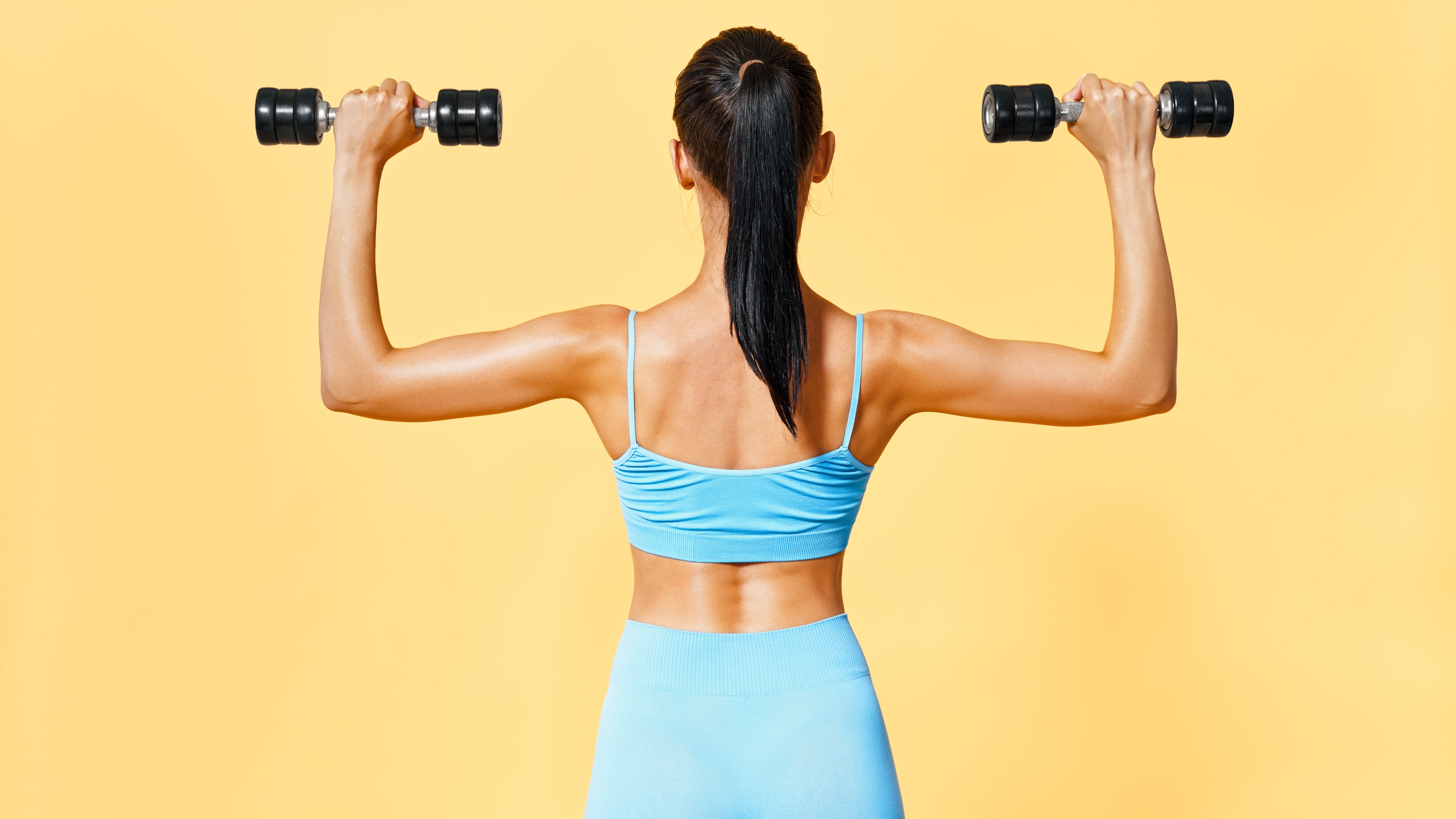 No jumping — this joint-friendly, low-impact workout uses a pair of light dumbbells to build full-body strength in 6 moves