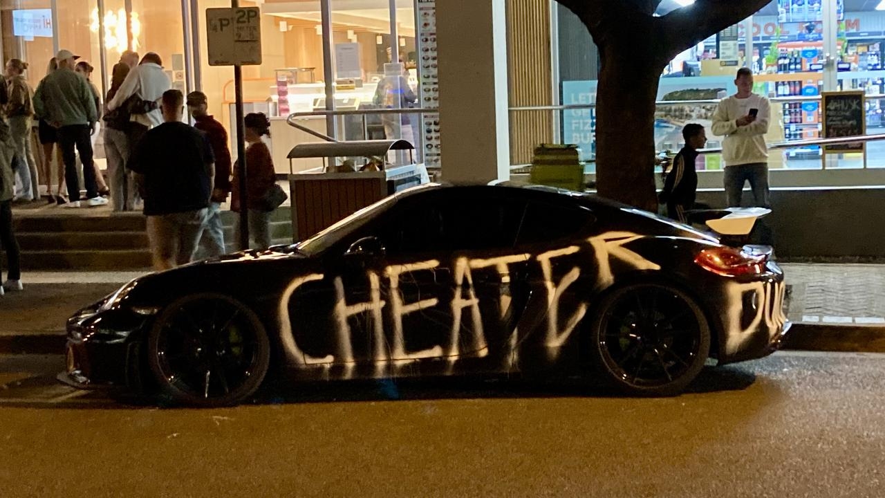 Luxury Porsche vandalised with ‘cheater' message