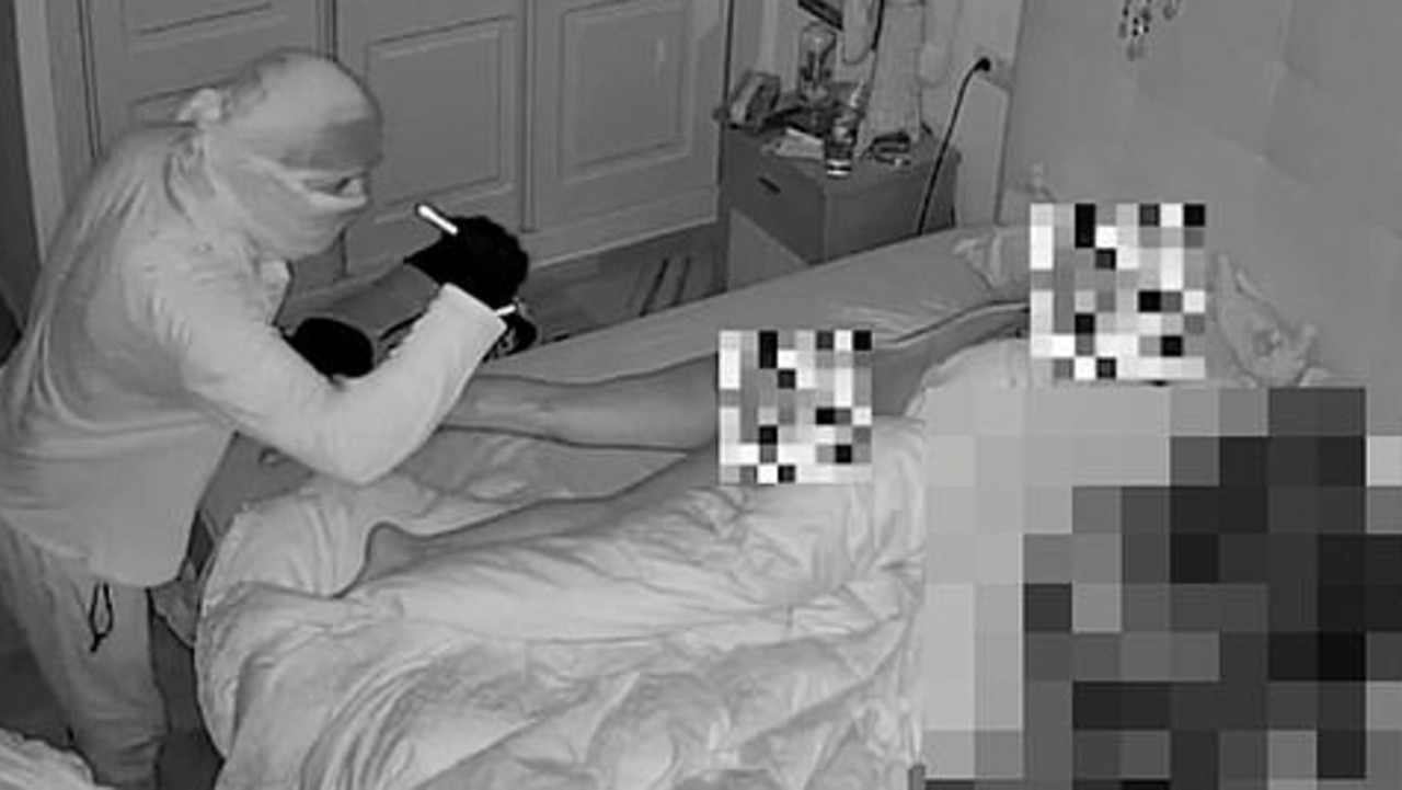 Moment ‘sick predator' shines flashlight on sleeping woman's naked body during break-in