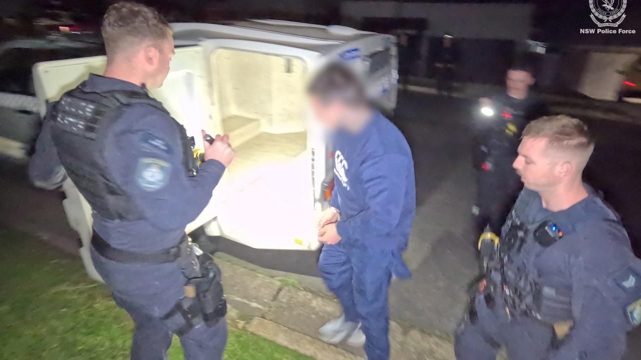 Rebels bikie charged after video emerges of caged cat being shot at point-blank range