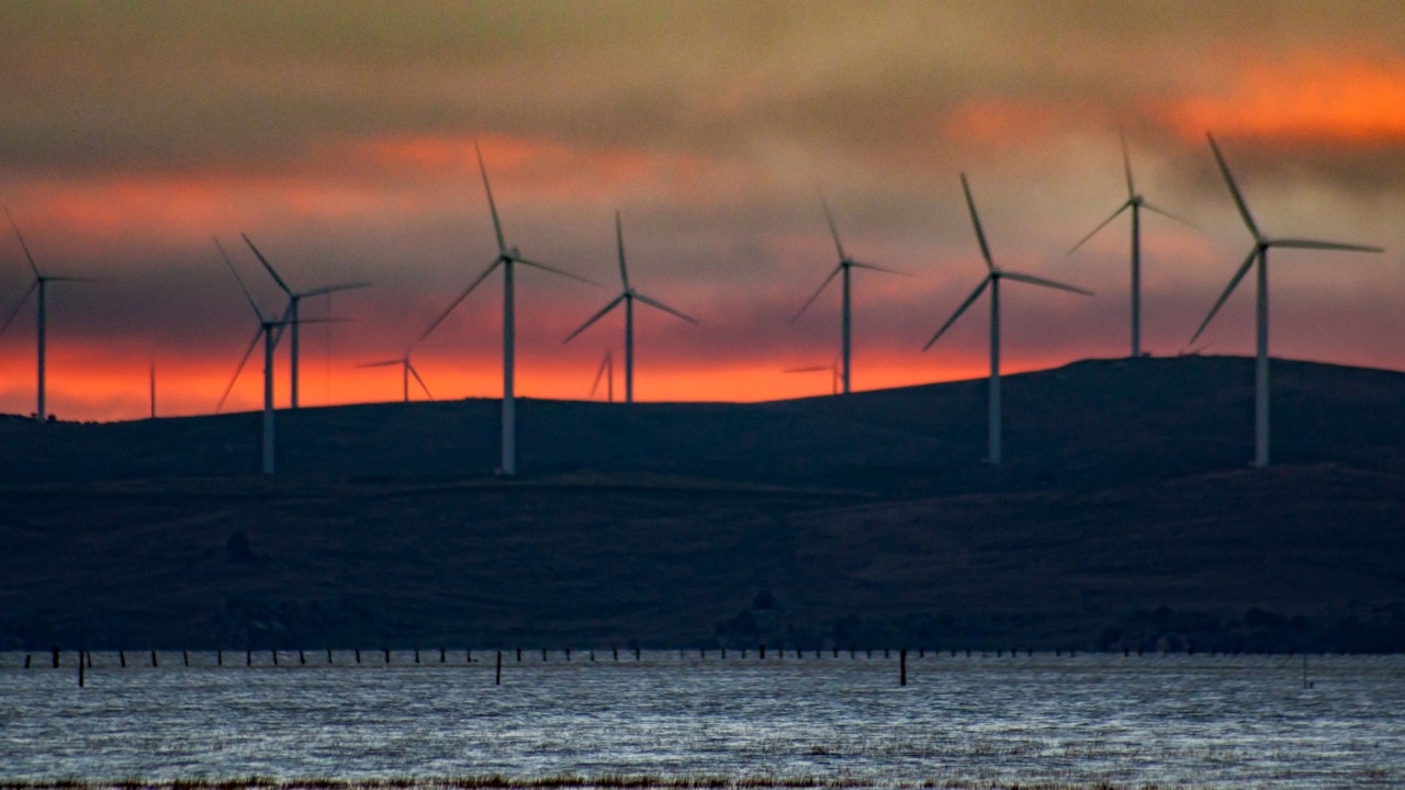 Regional NSW residents angrily reject wind turbine development and lash renewable energy chiefs in fiery town hall meeting