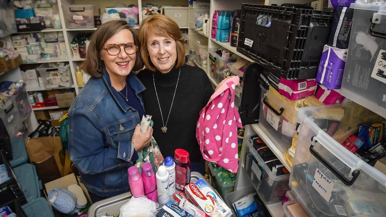 Joy Owen, Amanda Portus and Megan Edwards spend every Wednesday packing care packages for women DV at Catherine House