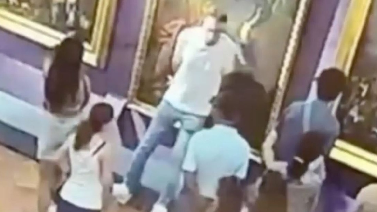 Tourist posing for pictures rips through priceless masterpiece painting