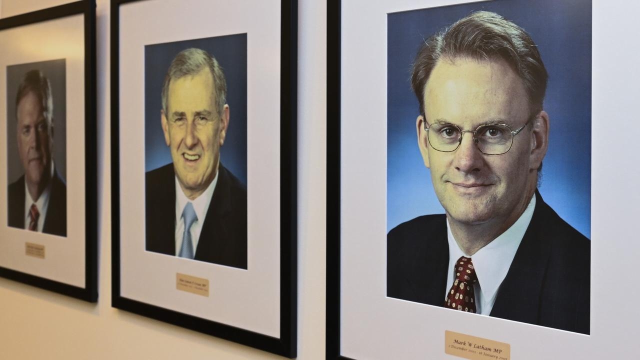 Labor will keep Mark Latham's portrait in the Parliament House party room with one major change