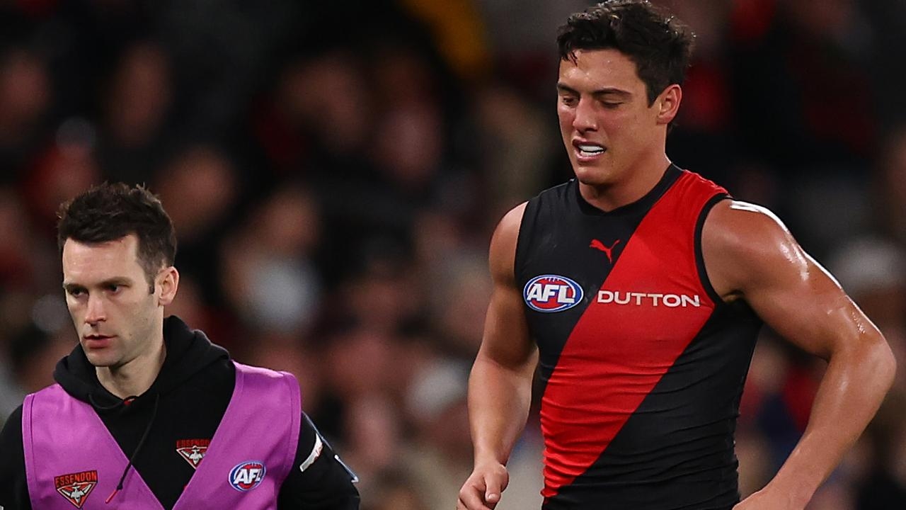Defender Zach Reid sent for surgery as injuries hit Essendon, Sydney hard