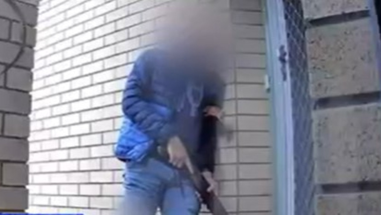 Security footage captures man with shotgun outside Brisbane home