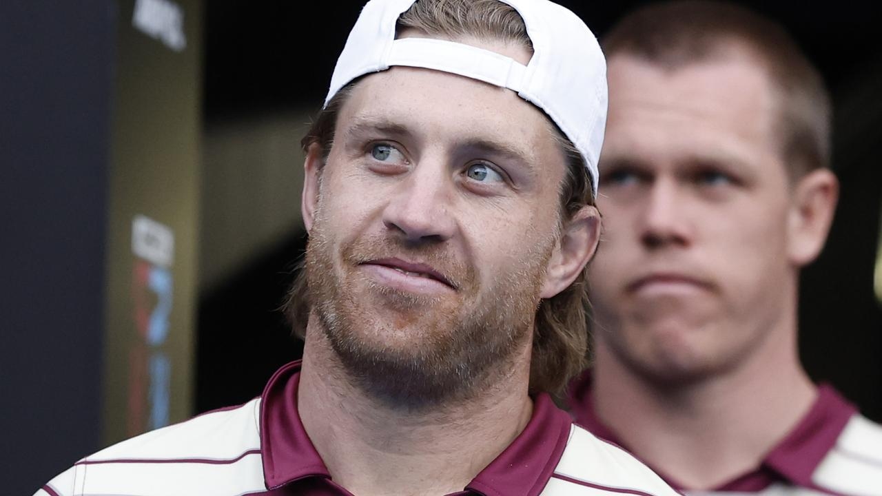 A smiling Cameron Munster back at Queensland training after his father's death leaves Blues fans in fear before State of Origin Game 3