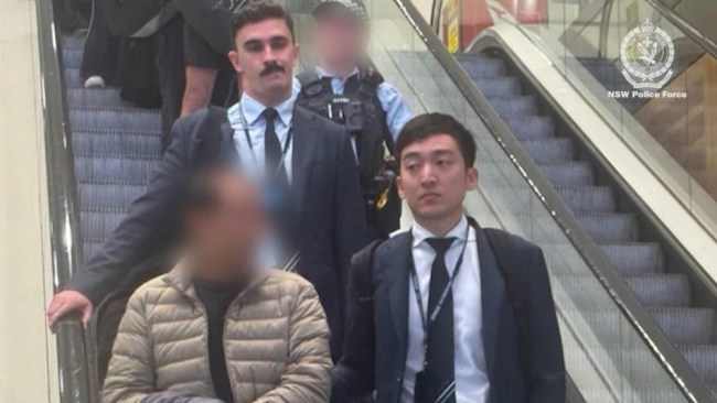 Man extradited from Queensland as NSW Police hunt seven others wanted over alleged $3 million Chinese blessing scam ring targeting elderly women in Sydney