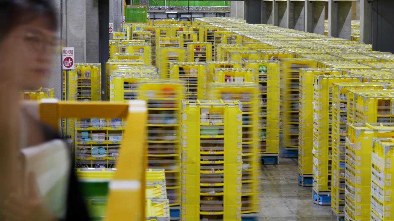 Aussie Amazon workers lagging behind in re-training as tech giant continues global automation rollout