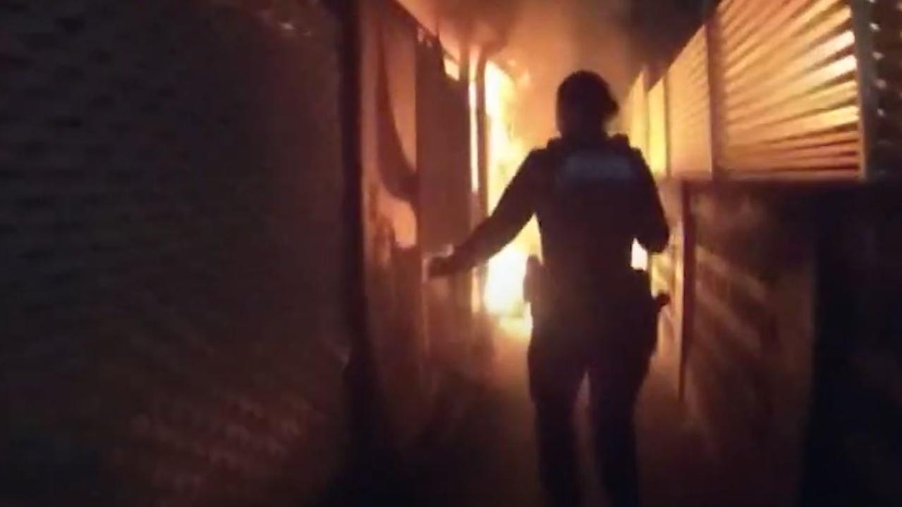 ‘I can't breathe': Scary footage captures woman's dramatic rescue from ‘suspicious' unit fire in Townsville, Qld