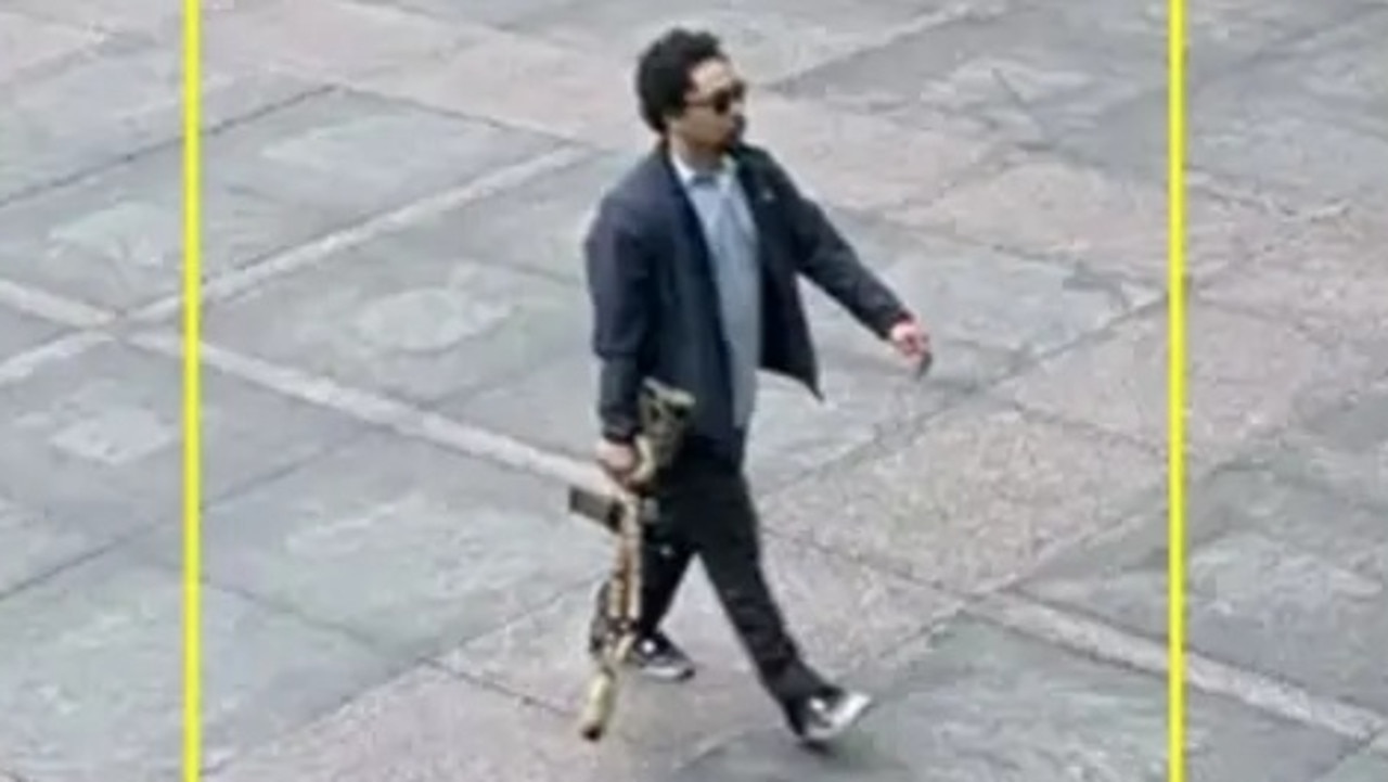 Rifle-toting New York shooter kills cop, critically injures two others