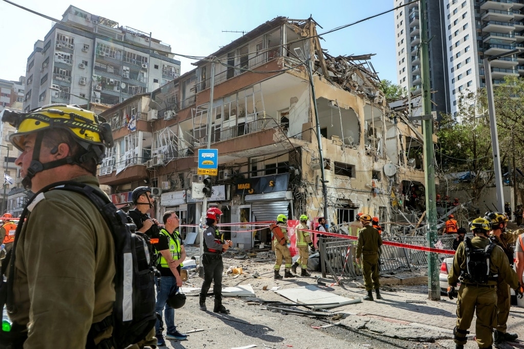 With missiles overhead, Tel Aviv residents huddle underground