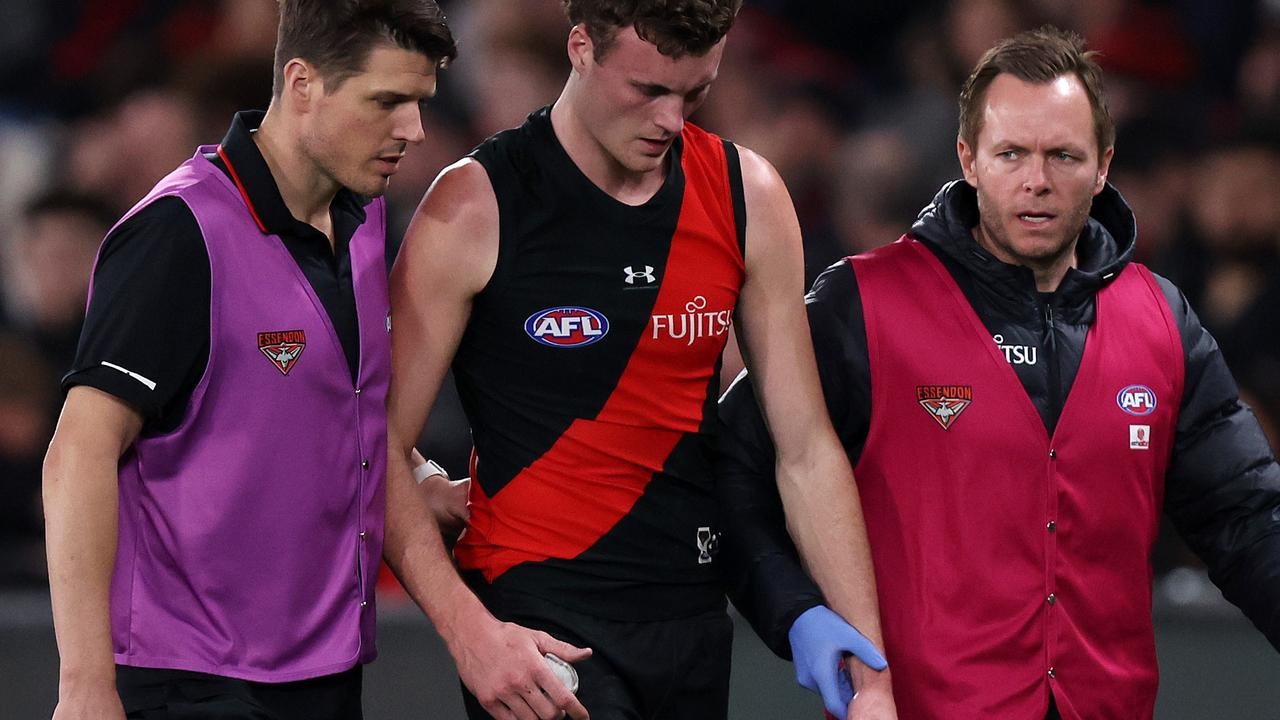 Essendon's Nik Cox says he'll get back to the AFL after concussion panel ordered he sit out 2025
