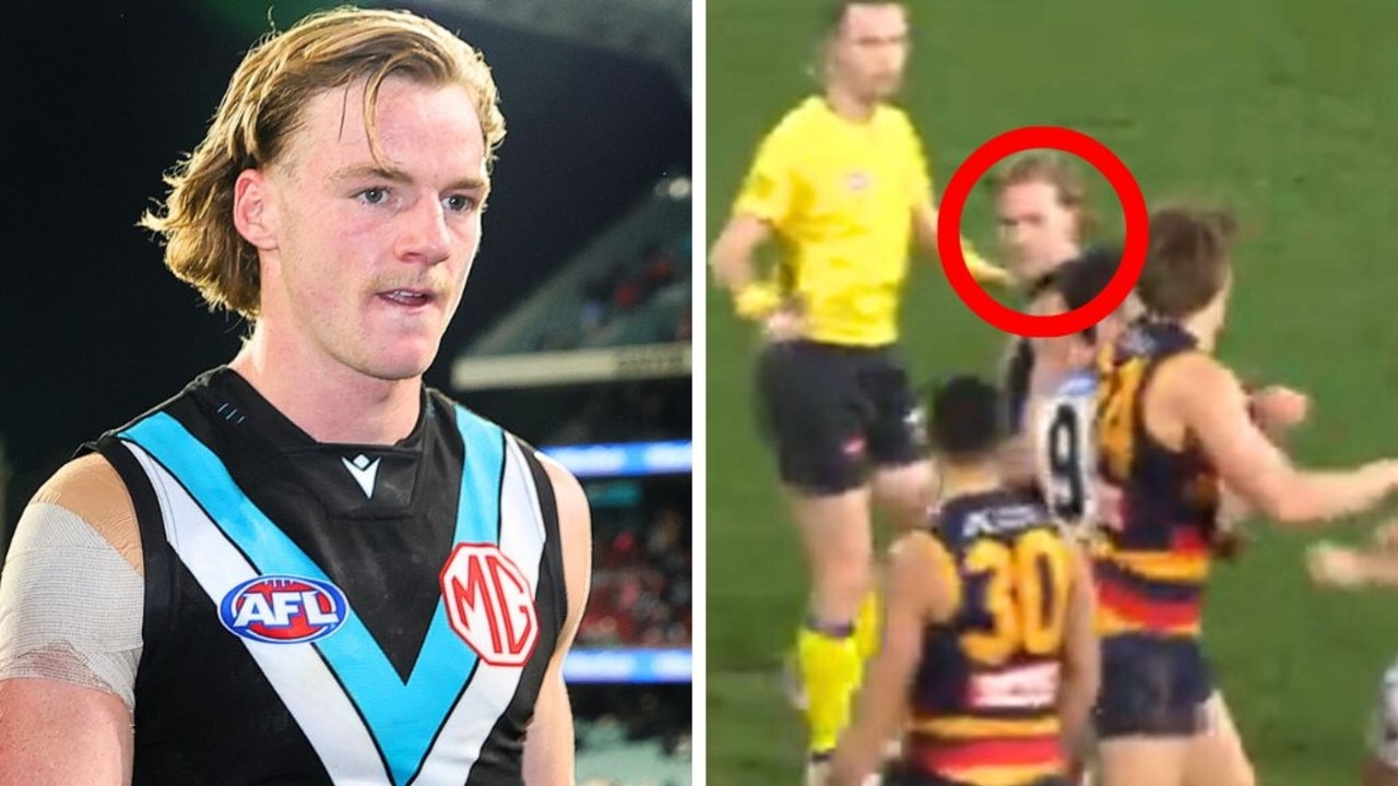 AFL world stunned by truly bizarre scenes as Port star Miles Bergman kicks it the wrong way