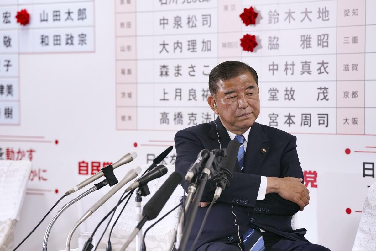 Japan ruling camp loses upper house majority, PM vows to stay on