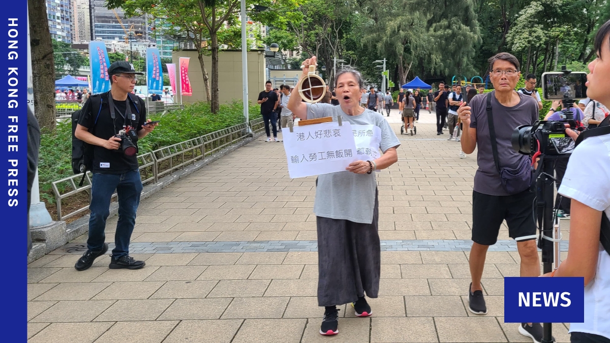 Hong Kong activist Lui Yuk-lin stages solo protest on Handover anniversary