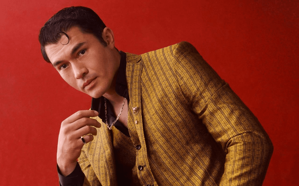 Actor Henry Golding Says Playing James Bond Is 'Every Actor's Kind Of Nightmare'