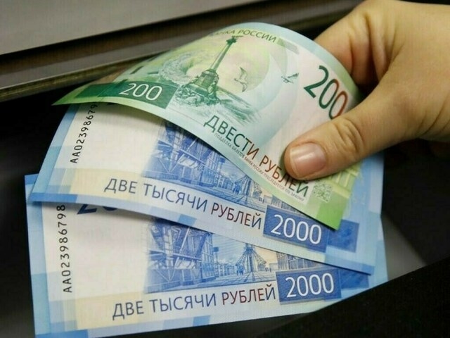 Rouble hovers near two-year high against dollar
