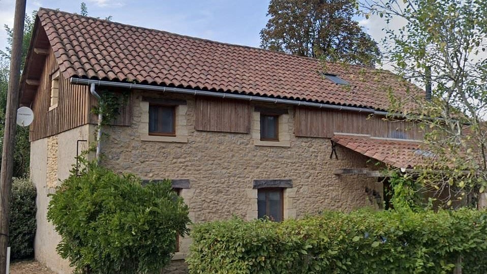 Manhunt underway for killer of British woman, 65, found outside her home in France 'covered in stab wounds' - as shocked villagers pay tribute to 'delightful' neighbour
